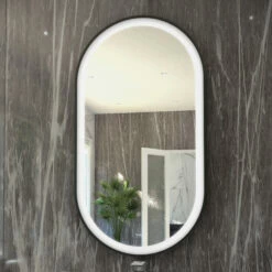 RAK Art Oval LED Illuminated Bathroom Mirror With Demister Pad 1000mm H X 550mm W - Matt Black -HEATANDPLUMB Sales rak ceramics art bathroom mirror rakartovmb5002